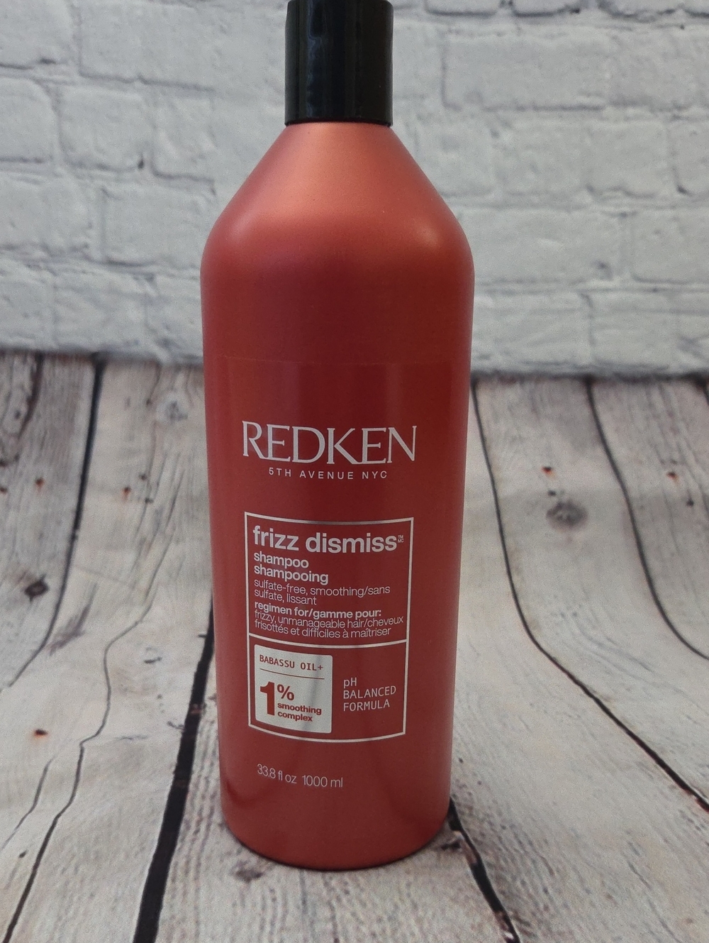 Redken Frizz Dismiss Shampoo - Matte Red Bottle with Black Cap